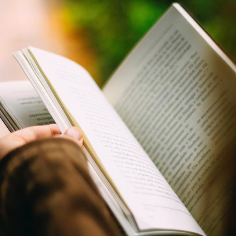 Person holding a book